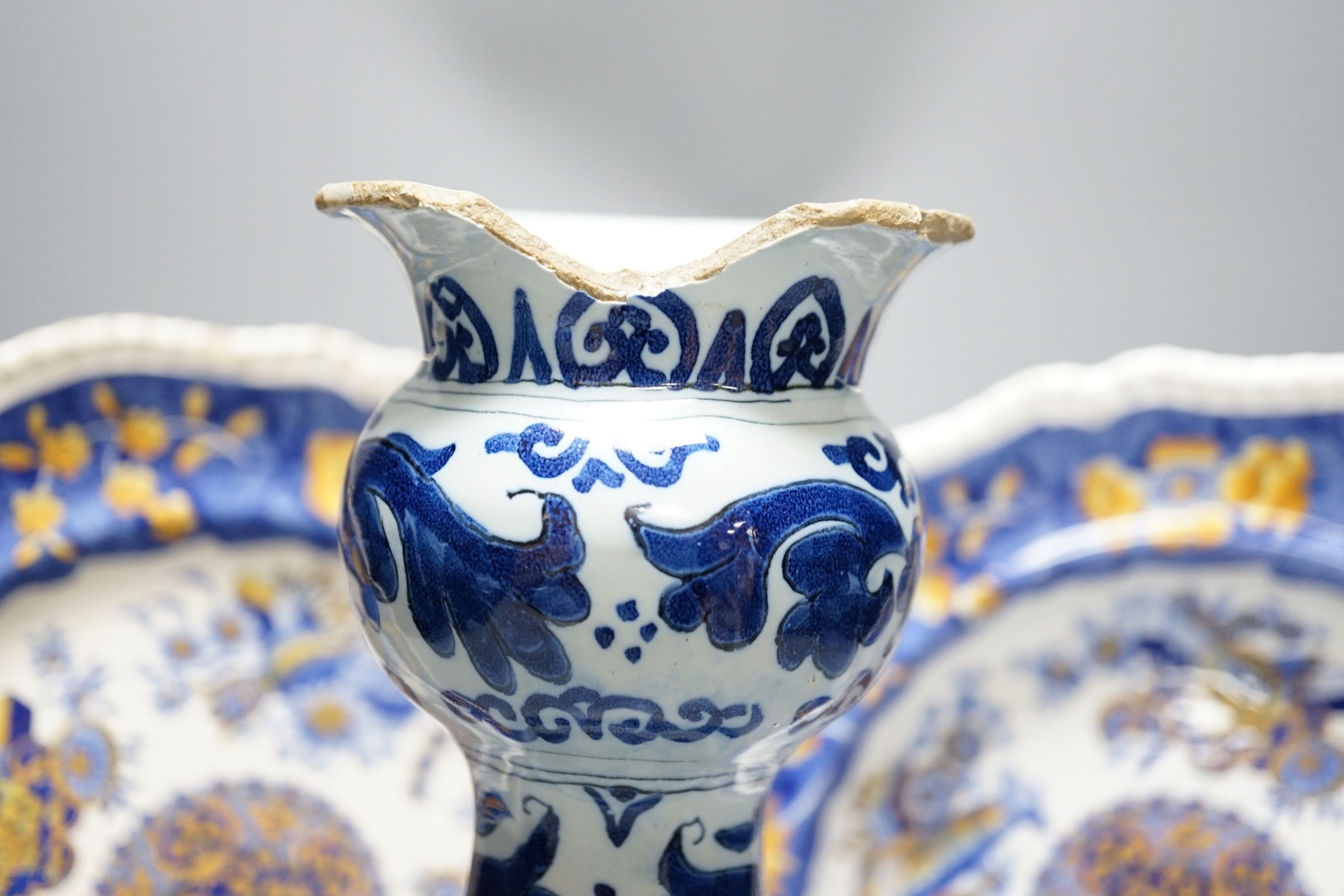 An 18th century Deflt vase and two early 19th century Spode pottery dishes, vase 24 cms high